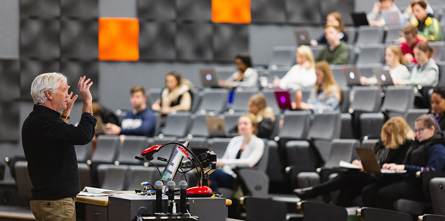 Students taking notes during a lecture at the University of Otago