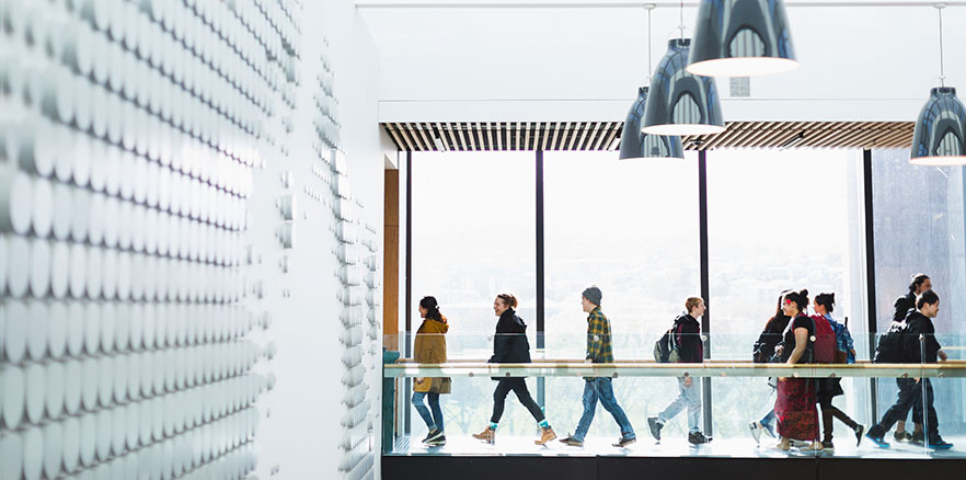 Students walking in University Plaza Building