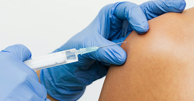 Person being vaccinated